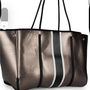HAUTE SHORE Metallic Bronze Tote with Black and White Stripe Ritz